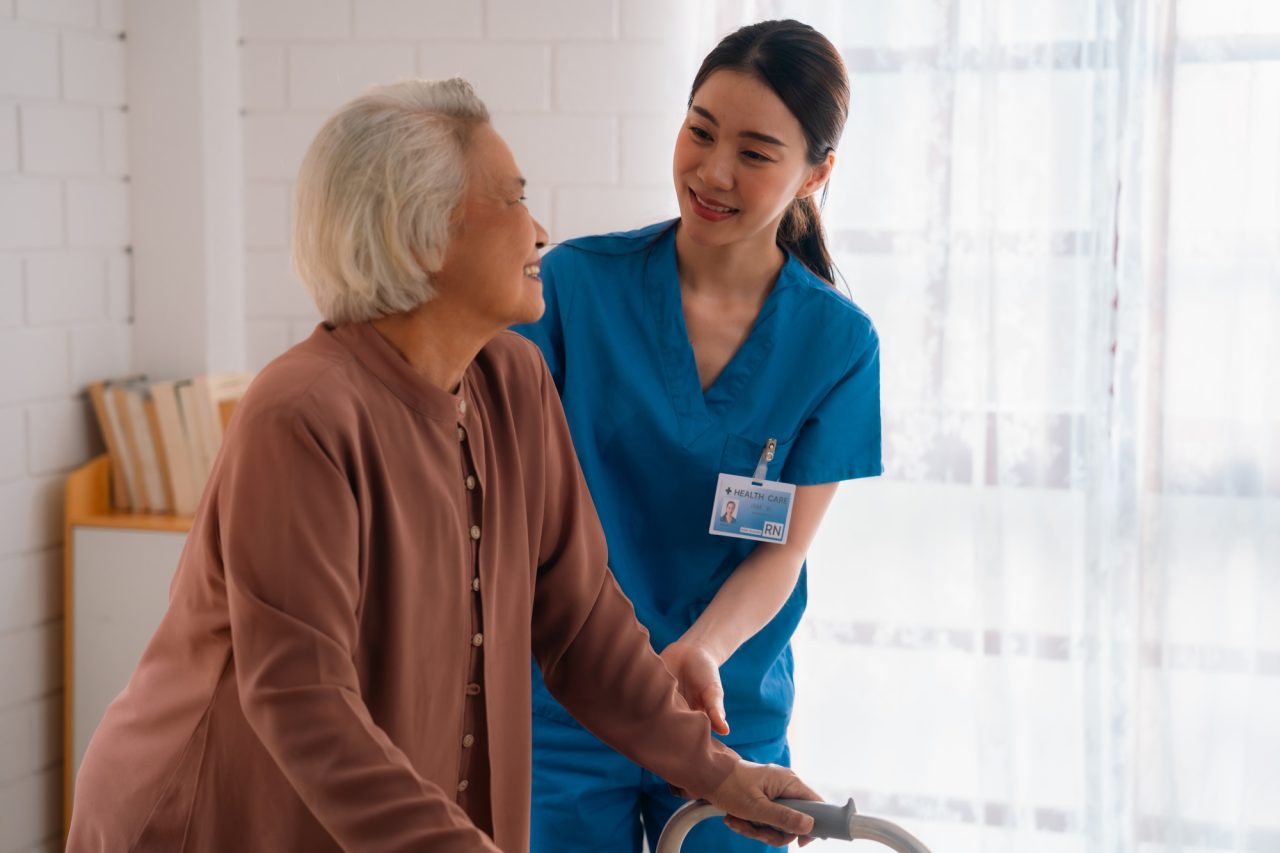 nurse helping patient
