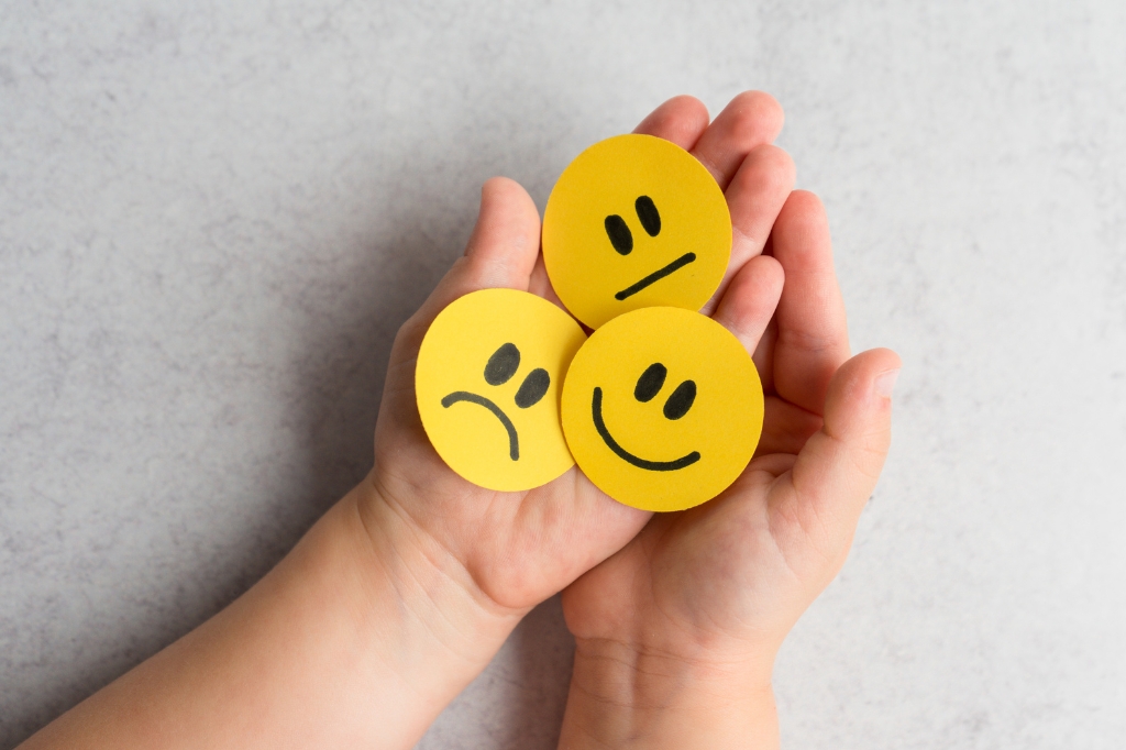 Human hand with lots of different emotional health